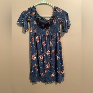 Off shoulder floral patterned dress.